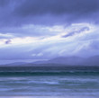 Foto: Clouds over rocky waters on beach Clouds over rocky waters on beach