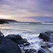 Foto: Waves washing up on rock formations Waves washing up on rock formations