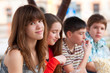Portrait of teenage girl having fun outdoor with her friends