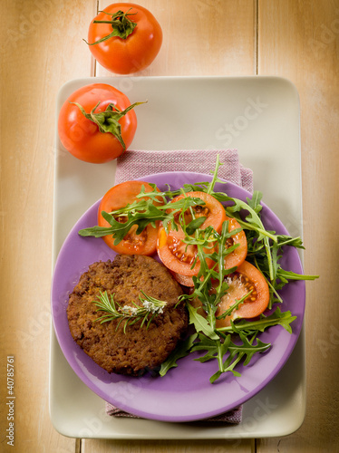 Photo: soy steak with arugua and tomatoes salad soy steak with arugua and tomatoes salad