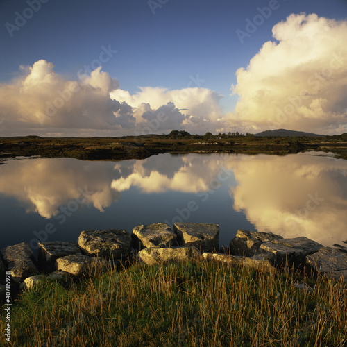 Photo: Clouds reflected in still lake Clouds reflected in still lake