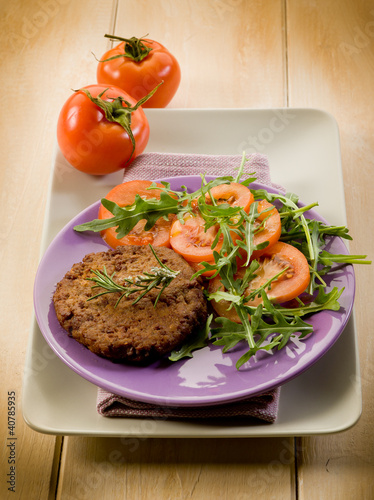 Photo: soy steak with arugua and tomatoes salad soy steak with arugua and tomatoes salad