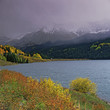 Photo: Rocky river and autumn trees in rural landscape Rocky river and autumn trees in rural landscape