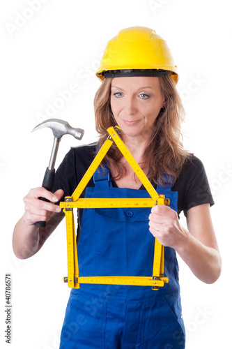 Photo: Frau mit Meterstab - woman with measuring meter Frau mit Meterstab - woman with measuring meter