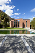 modern bricks house, surrounded by nature