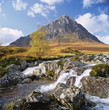 Rocky river in rural landscape