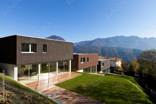 Photo: beautiful modern house with garden, outdoor beautiful modern house with garden, outdoor