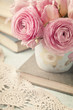 Pink flowers and books Pink flowers and books