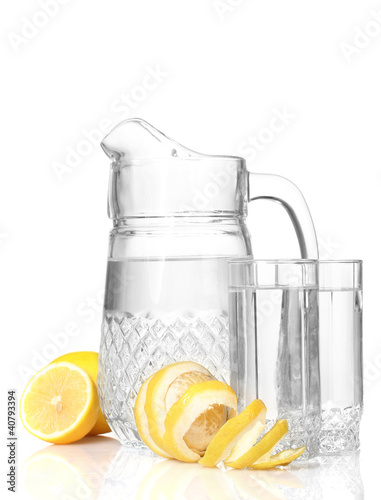 Photo: pitcher and glasses of lemonade and lemon isolated on white pitcher and glasses of lemonade and lemon isolated on white