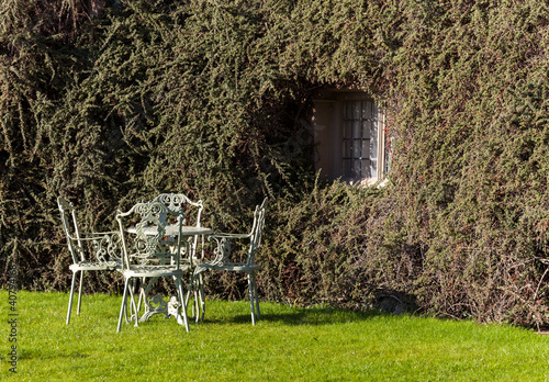 Photo: Garden table and chairs on lawn Garden table and chairs on lawn