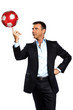 one business man playing juggling soccer ball