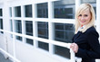 Businesswoman and corporate building
