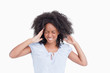 canvas print picture - Young woman touching her temples while being angry