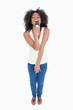 Young woman singing with a cordless microphone Young woman singing with a cordless microphone