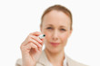 Businesswoman with a whiteboard marker