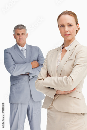 Photo: Close-up of a serious business people with folded arms Close-up of a serious business people with folded arms