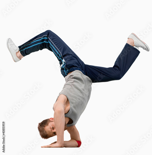 Photo: Break dancer doing a hand stand Break dancer doing a hand stand