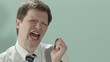 Exhausted and tired business man yawning at work