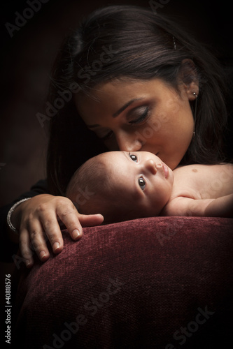 Photo: Attractive Ethnic Woman with Her Newborn Baby Attractive Ethnic Woman with Her Newborn Baby