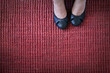 Black Pumps on Red Rug