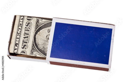 Photo: US dollar bill in a matchbox isolated on white US dollar bill in a matchbox isolated on white