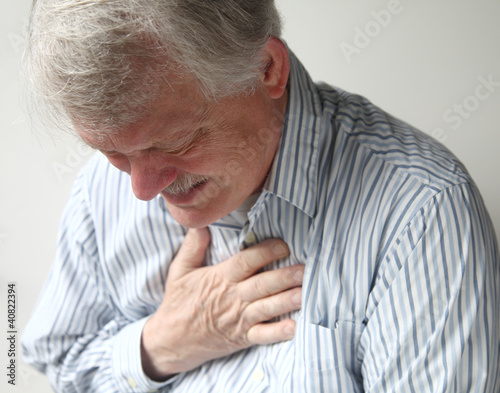 Photo: man with severe chest pain man with severe chest pain