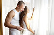 Closeup of happy couple at bedroom