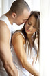 Closeup of happy couple at bedroom