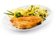 Fish dish - fried fish fillets and vegetable salad Fish dish - fried fish fillets and vegetable salad