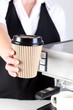 Barista handing you a coffee