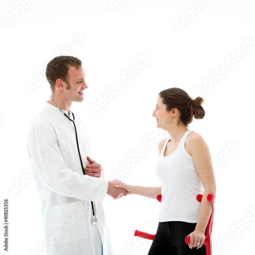 Photo: Smiling doctor and his patient Smiling doctor and his patient