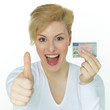 Young woman has thumb up for getting a driver licence