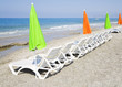 Beach chair and colorful umbrella on the beach Beach chair and colorful umbrella on the beach