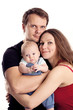 Photo: Portrait of a young caucasian couple with baby Portrait of a young caucasian couple with baby