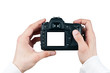 Photo: Digital camera in man hand, Taking photo isolated on white, cli Digital camera in man hand, Taking photo isolated on white, cli