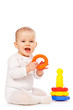 Small child play with toys on white background