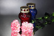 Memory lanterns with candles,  carnations and black ribbon