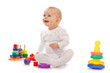 Small child play with toys on white background