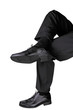 Crosslegged businessman