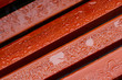 Water drop on the bench in park