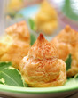 fresh creamy eclair cakes served on green plate