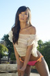 Photo: Beautiful young exotic woman in swimwear Beautiful young exotic woman in swimwear