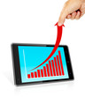 Photo en ligne au meilleur prix Human hand pulling up red arrow from a bar graph in a tablet pc