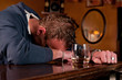Drunk man who has had one too many at the bar