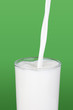Milk pouring into a glass.