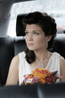 Beautiful young bride portrait in a car