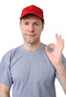 Feeling good working man in a red cap