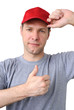 Feeling good working man in a red cap