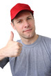Feeling good working man in a red cap