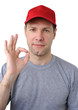 Feeling good working man in a red cap